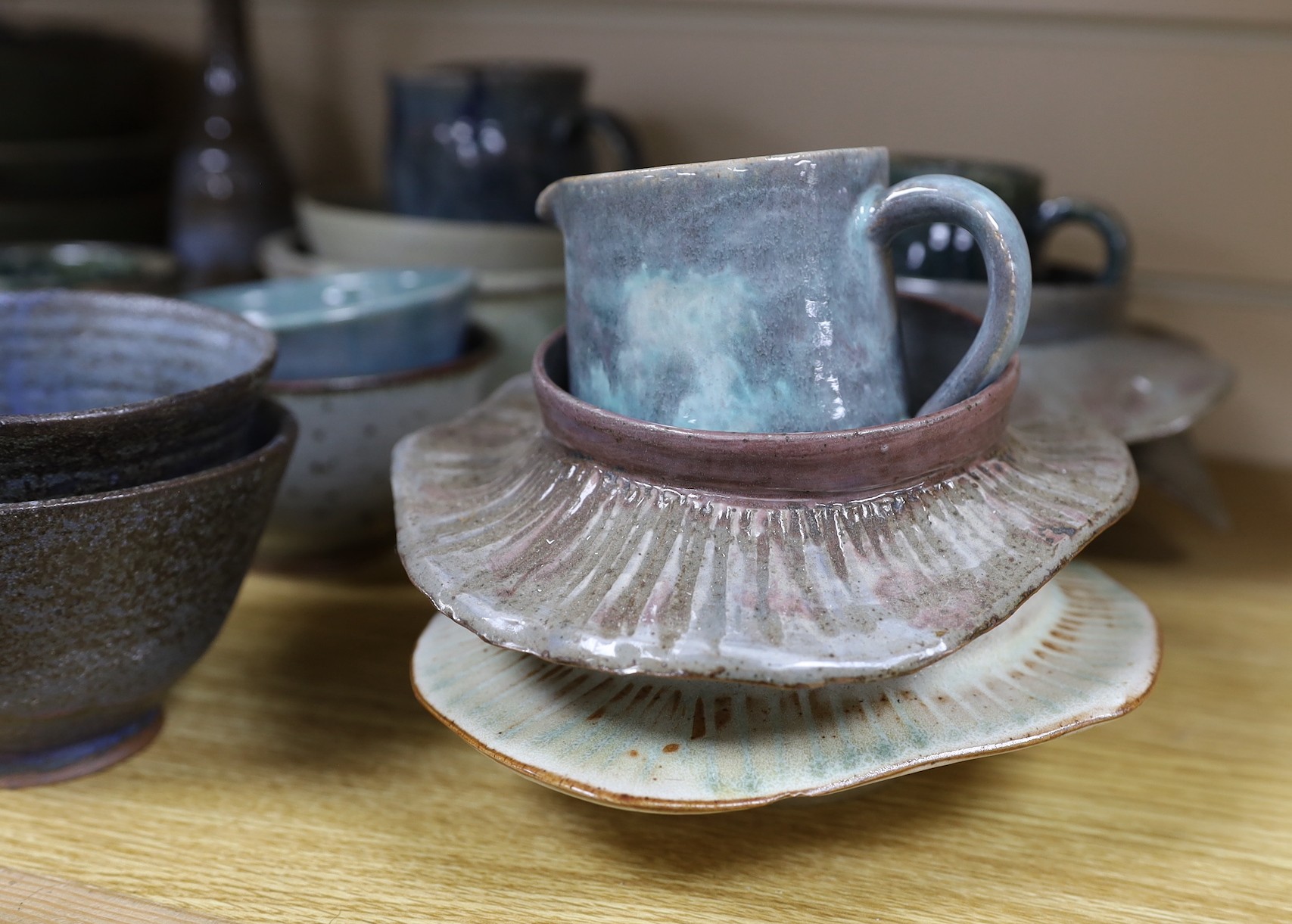 A collection of studio pottery bowls jugs and dishes